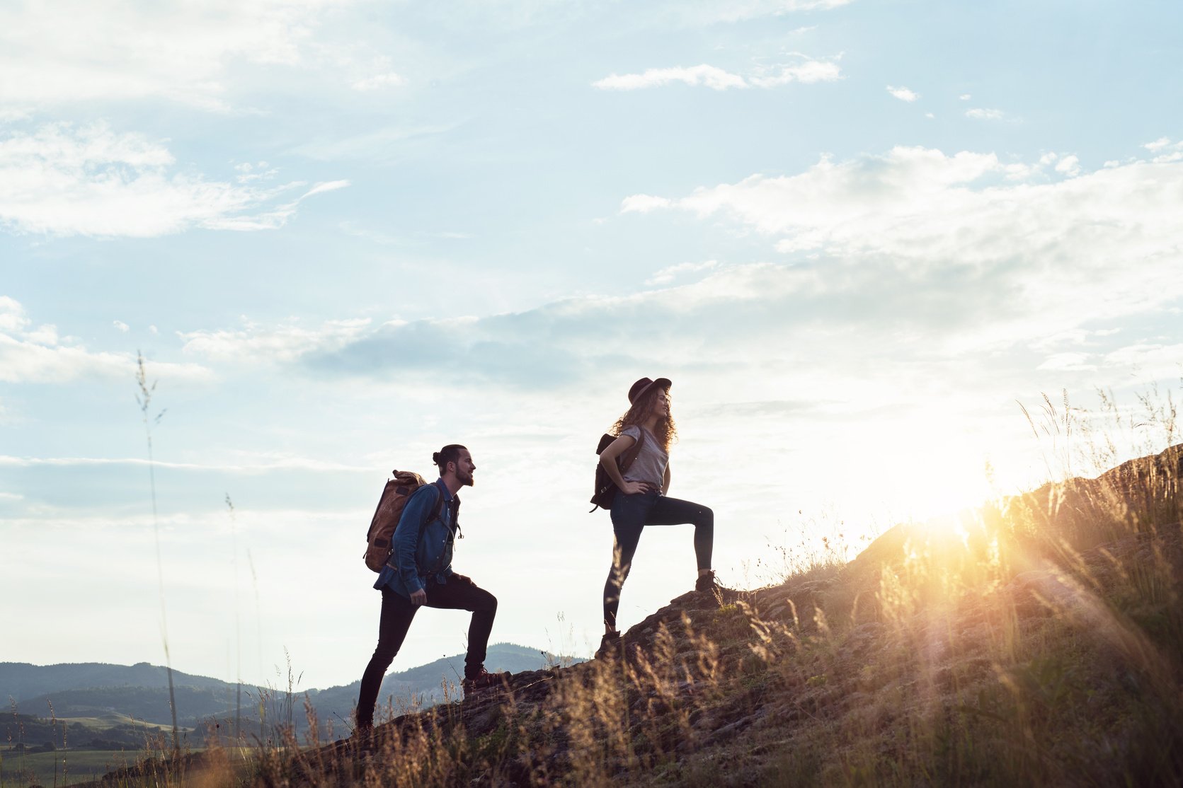 Travellers Climbing Up a Mountain